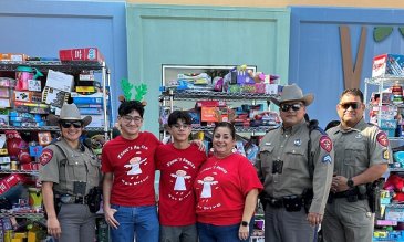 Isaac Garza's family at the toy drive